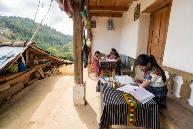 Maria Quiró's children study at their home
